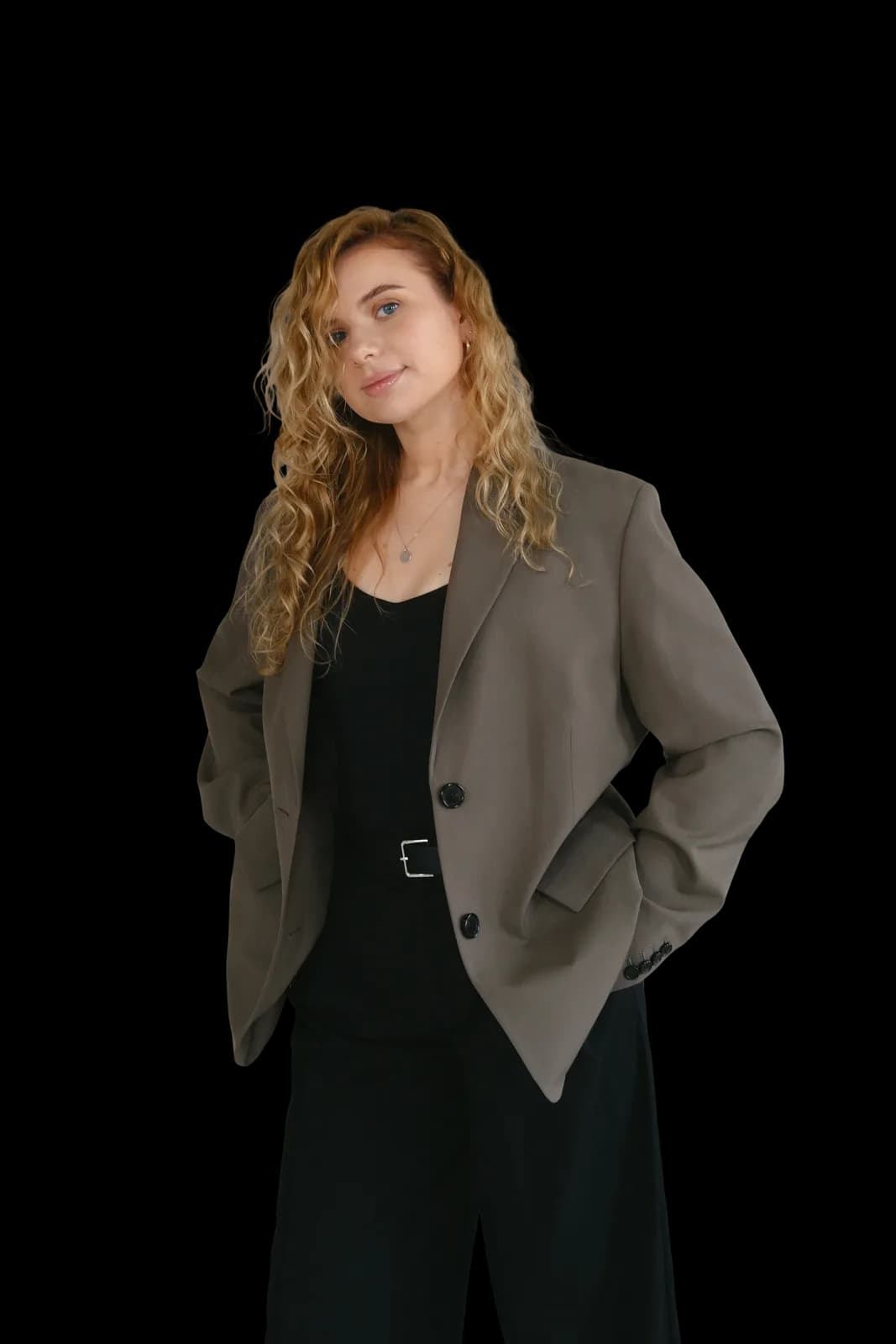 Ieva Stanelliunaite, standing, in a brown blazer