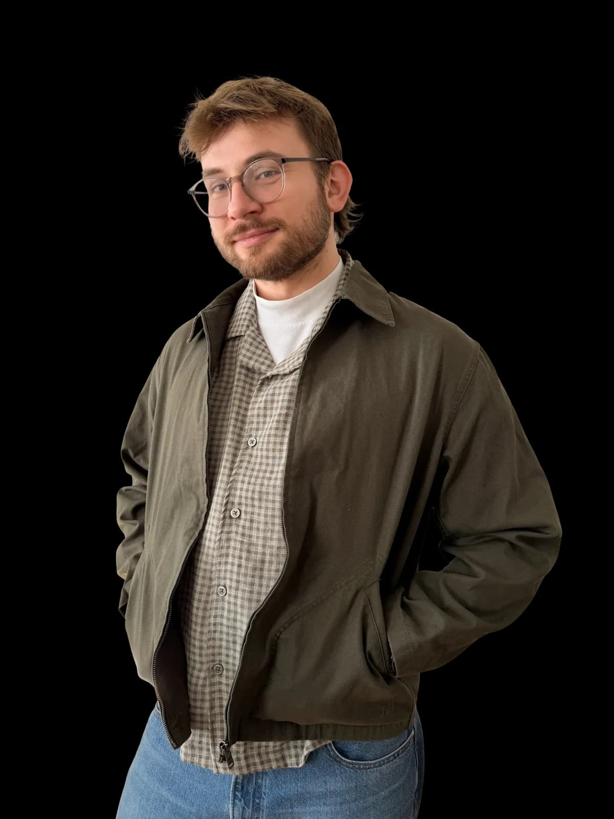 Oliver Siula, standing, in a dark jacket